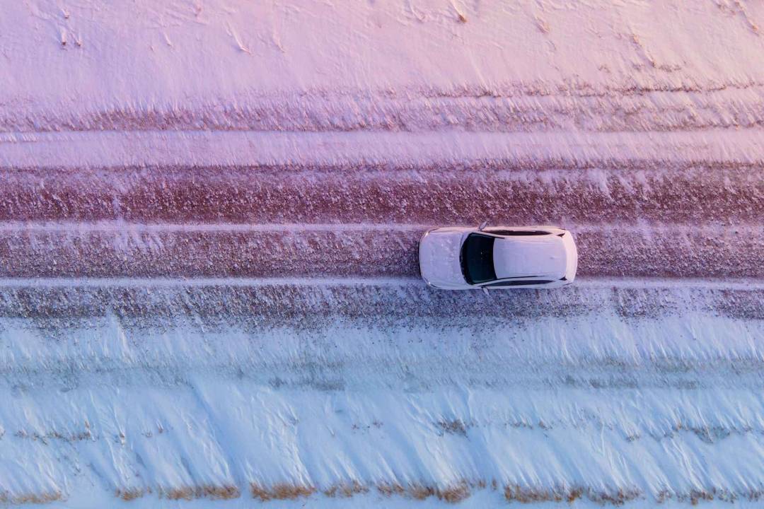 White Car On Snowy Road In Daytime